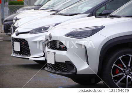 Car image: Toyota cars lined up at a dealership Car image: Toyota cars lined up at a dealership 128354079