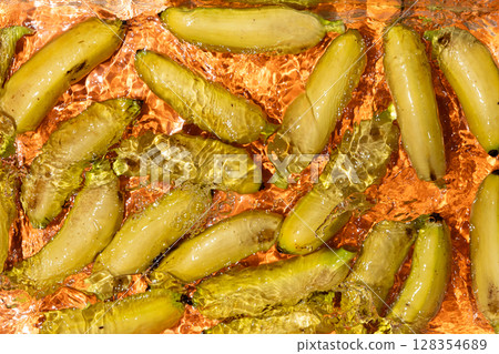 Baby Bananas Splashing into Water Top View Baby Bananas Splashing into Water Top View 128354689