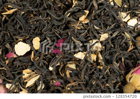 Loose Black Tea with Ginseng and Rose Petals Macro Top View Loose Black Tea with Ginseng and Rose Petals Macro Top View 128354720