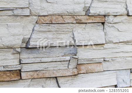 Close up shot of the decorative stone wall 128355201