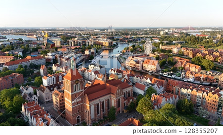 Aerial photo taken by drone over the historic tourist center of Gdansk, the city hall and the cathedral on a summer day, Poland, Europe 128355207
