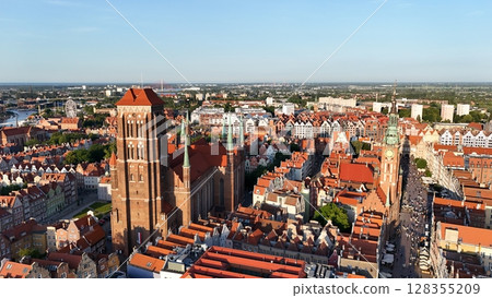 Aerial photo taken by drone over the historic tourist center of Gdansk, the city hall and the cathedral on a summer day, Poland, Europe 128355209