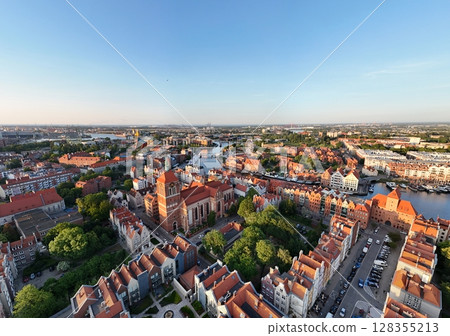Aerial photo taken by drone over the historic tourist center of Gdansk, the city hall and the cathedral on a summer day, Poland, Europe 128355213