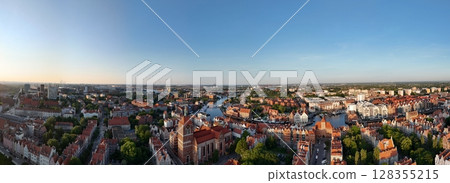 Aerial photo taken by drone over the historic tourist center of Gdansk, the city hall and the cathedral on a summer day, Poland, Europe Aerial photo taken by drone over the historic tourist center of Gdansk, the city hall and the cathedral on a summer day, Poland, Europe 128355215