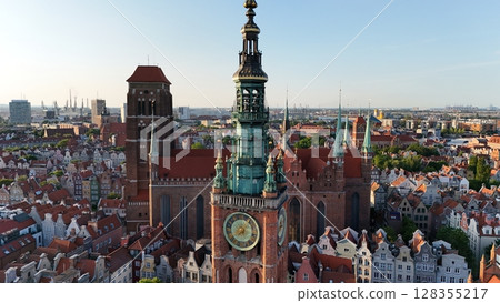 Aerial photo taken by drone over the historic tourist center of Gdansk, the city hall and the cathedral on a summer day, Poland, Europe 128355217