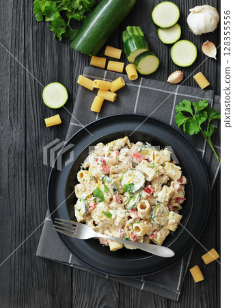 chicken alfredo rigatoni with zucchini and pepper 128355556