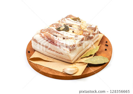 Traditional salted pork fat with spices isolated on white background Traditional salted pork fat with spices isolated on white background 128356665