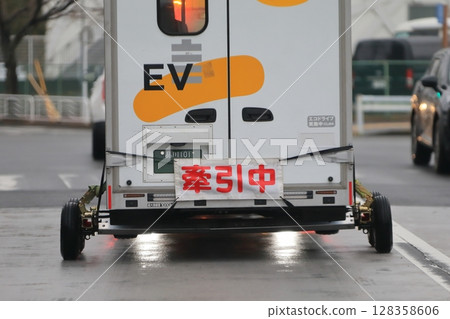 Image of a truck being towed 128358606