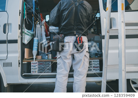 Air conditioner installation company's work vehicle Air conditioner installation company's work vehicle 128359409