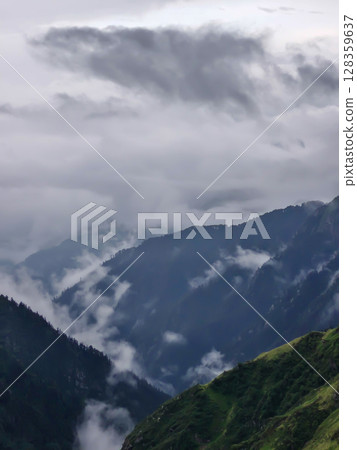 Misty Mountain View with Lush Slopes Misty Mountain View with Lush Slopes 128359637