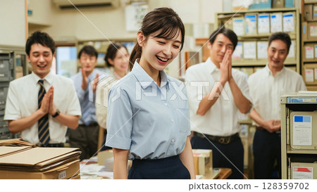 A woman surrounded by a large group of people 128359702