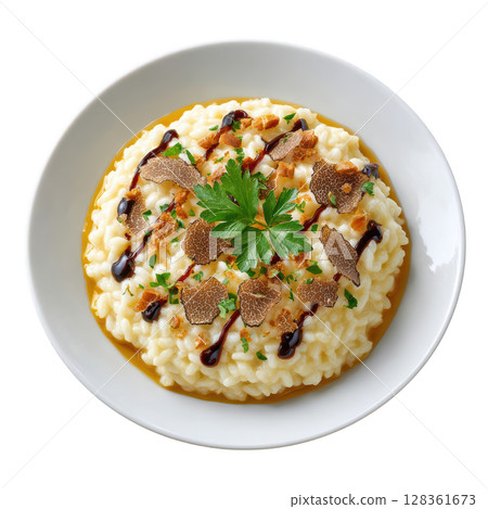 Creamy Risotto Infused with Black Truffle and Topped with Shaved Truffle Slices for Gourmet Dish Experience 128361673