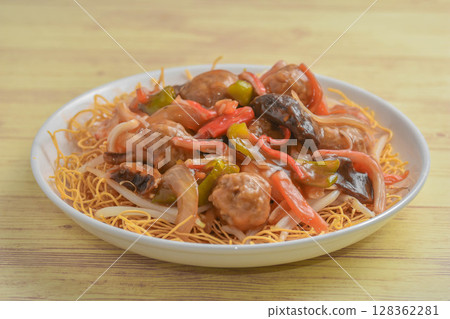 Meatball and vegetable udon noodles 128362281
