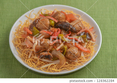 Meatball and vegetable udon noodles 128362284