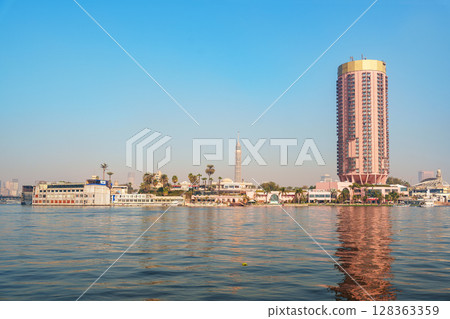 Cairo skyline with the Nile River and iconic architecture during a sunny daytime 128363359