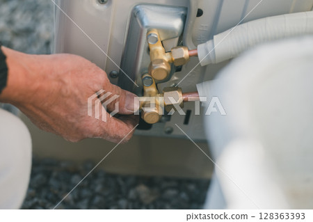 Air conditioner installation Air conditioner installation 128363393