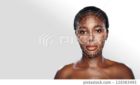 3D facial mapping showcasing detailed facial structure on a model against a simple backdrop 3D facial mapping showcasing detailed facial structure on a model against a simple backdrop 128363491