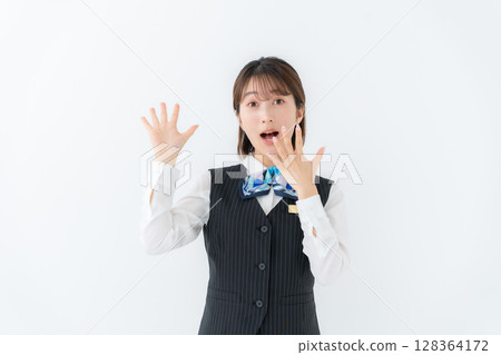 Young woman in uniform, business, surprised Young woman in uniform, business, surprised 128364172