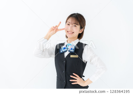 Young woman in uniform, business, peace sign Young woman in uniform, business, peace sign 128364195