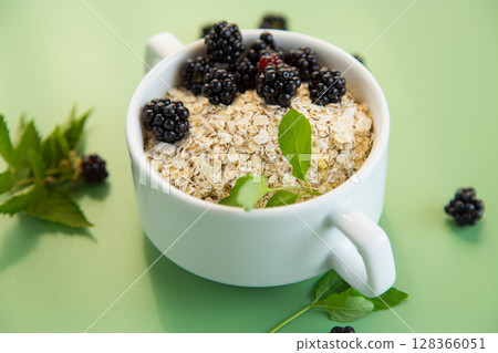Natural breakfast oatmeal with seasonal berries 128366051