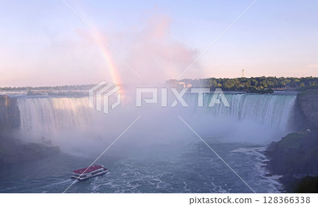 Hornblower Boat sailing on the Niagara River with rainbow and Horseshoe Falls on the background in Ontario, Canada Hornblower Boat sailing on the Niagara River with rainbow and Horseshoe Falls on the background in Ontario, Canada 128366338
