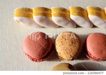 Delightful and Delicious Assortment of Colorful Macarons and Indulging Pastries Galore 128366477