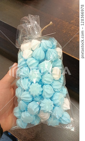 A Bag Filled with Colorful and Delicious Meringue Cookies Perfect for Any Event or Celebration 128366978