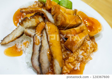 Top view of Red pork and crispy pork rice, focus selective Top view of Red pork and crispy pork rice, focus selective 128367600