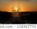 Waves and sunsets 128367734