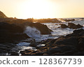 Waves and sunsets 128367739
