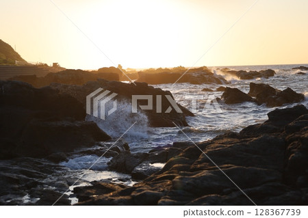 Waves and sunsets Waves and sunsets 128367739