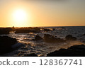 Waves and sunsets 128367741