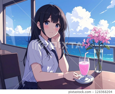 A girl drinking a drink at a cafe 128368204