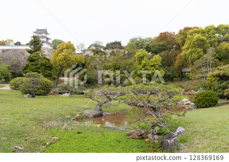 Tatsumi Tower on top of Akashi Castle stone wall and Otome Pond and gazebo in Musashi Garden Tatsumi Tower on top of Akashi Castle stone wall and Otome Pond and gazebo in Musashi Garden 128369169