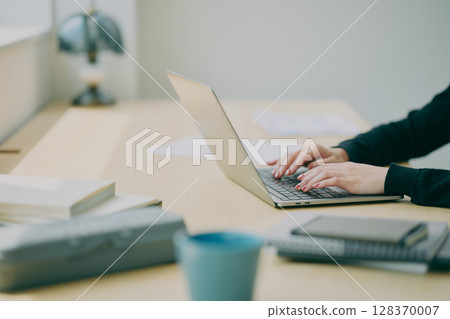 Working person's hands 128370007