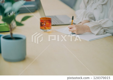 Working person's hands 128370015