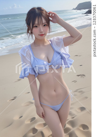 Young woman in swimsuit touching her hair on summer beach 128370061