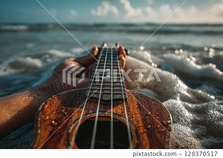 First-Person Ukulele Strumming at Beach with Ocean Waves First-Person Ukulele Strumming at Beach with Ocean Waves 128370517