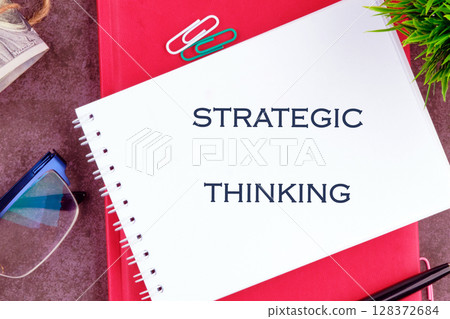 A conceptual phrase on the topic of business STRATEGIC THINKING. Strategic Business Planning concept. 128372684