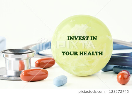 THE CONCEPT PHRASE INVEST IN YOUR HEALTH. Concept health, sport, diet and fitness 128372745
