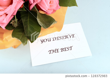 The concept phrase is YOU DESERVE THE BEST. The concept of good mood. Self care and happiness concept 128372983