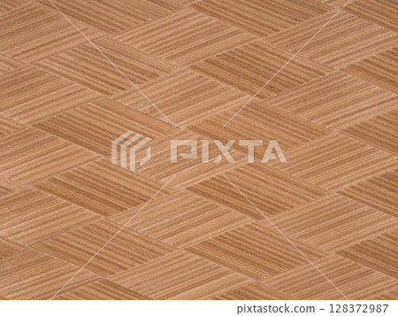 Elegant crisscrossing wooden veneer with a smooth finish and natural tones. 128372987