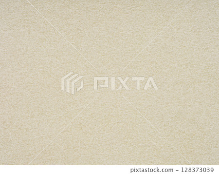 The creamy texture of this paper evokes warmth, offering a canvas of comfort and subtle creativity 128373039