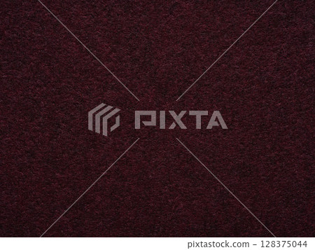 A deep plum enigma, this felt surface captivates with its rich, luxurious texture and a hint of nocturnal mystery A deep plum enigma, this felt surface captivates with its rich, luxurious texture and a hint of nocturnal mystery 128375044
