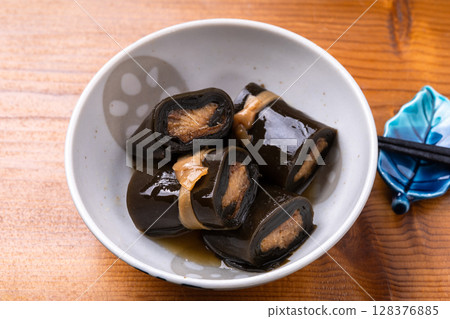 Herring wrapped in kelp 128376885