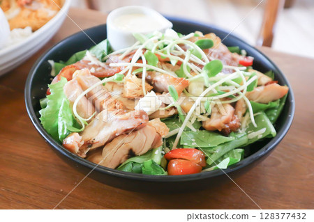 pork salad or grilled pork salad or caesar salad or vegetable salad with pork pork salad or grilled pork salad or caesar salad or vegetable salad with pork 128377432