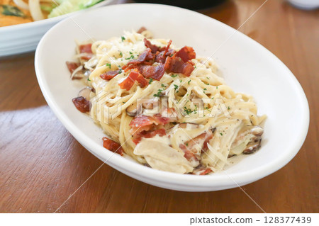 pasta or pasta carbonara or spaghetti or spaghetti carbonara 128377439
