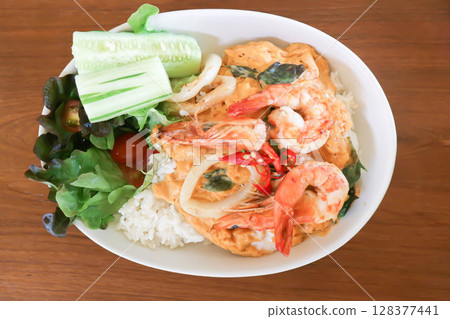 creamy omelet or omelet or omelette or fried egg with shrimp and squid or seafood omelette and rice creamy omelet or omelet or omelette or fried egg with shrimp and squid or seafood omelette and rice 128377441