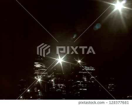 the moon in the night sky 128377681