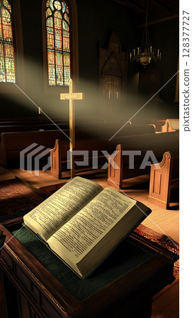 A book is open on a table in a church 128377727
